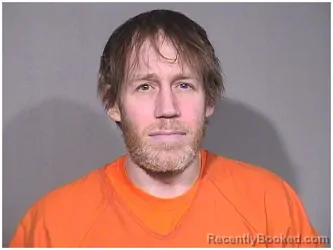 Mugshot of KYLE J BENSON