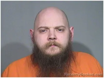 Mugshot of CODY A OSTICK booked in McHenry County, Illinois on April 16, 2026