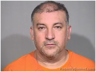 Mugshot of Ruben Mondragon Aguilar booked in McHenry County, Illinois on August 8, 2026