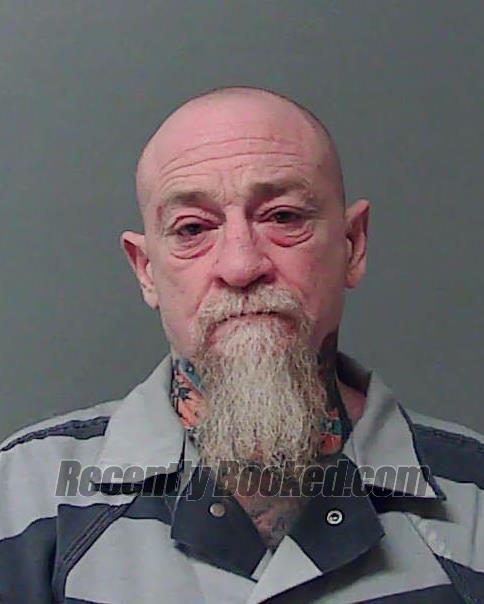 Booking photo from Macon County, Illinois