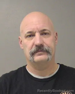 Booking photo from Macon County, Illinois