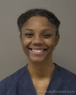 Mugshot of DANIA COURTNEY CROSS booked in Macon County, Illinois on March 6, 2026