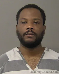 Mugshot of ZHAKIR ANDRAVION JOHNSON booked in Macon County, Illinois on March 9, 2026