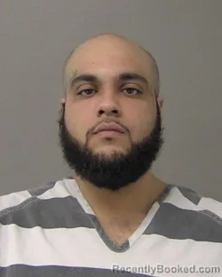 Mugshot of CARLOS EUGENE Junior TAYLOR booked in Macon County, Illinois on March 13, 2026