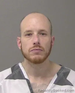 Mugshot of ADAM JOHN MAYER booked in Macon County, Illinois on March 18, 2026