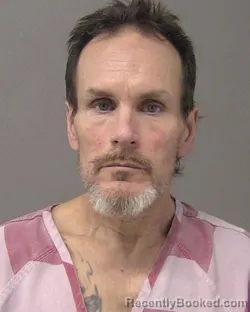 Mugshot of RONALD DEAN Senior LEWIS booked in Macon County, Illinois on March 20, 2026