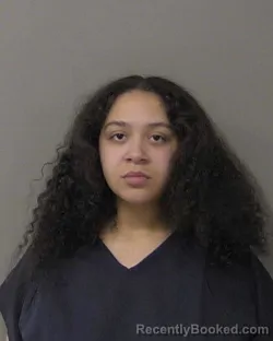 Mugshot of QWENTIANA LANAE IVY booked in Macon County, Illinois on March 24, 2026