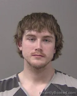 Mugshot of AARON MICHAEL GRUSSING booked in Macon County, Illinois on March 27, 2026