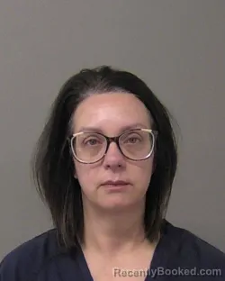 Mugshot of JENNIFER MARIE GARNER booked in Macon County, Illinois on March 28, 2026