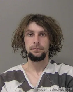 Mugshot of AUSTIN ROBERT TATE booked in Macon County, Illinois on April 1, 2026