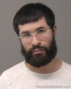 Mugshot of JUSTIN RAY DELEON booked in Macon County, Illinois on April 2, 2026