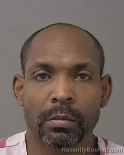 Mugshot of MEDDIE LAVELL Junior LEWIS booked in Macon County, Illinois on April 25, 2026