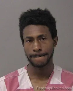 Mugshot of AKEEM LAMONT EVANS booked in Macon County, Illinois on April 26, 2026