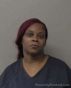 Mugshot of ANGEL SHARIE BRITTON booked in Macon County, Illinois on May 6, 2026