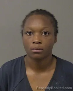 Mugshot of MARLITA SARIAHARI RUSSELL booked in Macon County, Illinois on May 18, 2026