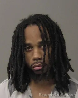 Mugshot of SYDNEY DEANDRE Junior GIVENS booked in Macon County, Illinois on June 20, 2026