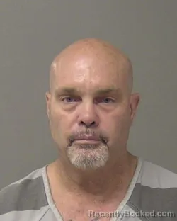 Mugshot of MARK EDWARD SNOW booked in Macon County, Illinois on June 30, 2026