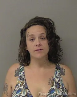 Mugshot of ANGEL MARIE MARTOS booked in Macon County, Illinois on July 1, 2026