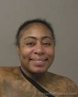 Mugshot of ASHLEE NICKOLE WALKER booked in Macon County, Illinois on July 9, 2026