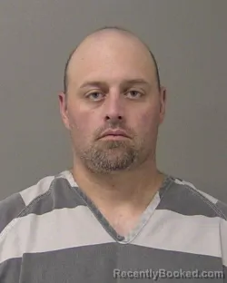 Mugshot of Adam Scott Waller booked in Macon County, Illinois on August 18, 2026