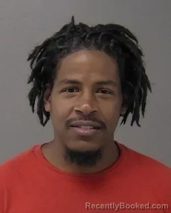 Mugshot of Devante Rashad Ambrose booked in Macon County, Illinois on August 21, 2026