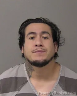 Mugshot of Vicente Avalos Junior Andrade booked in Macon County, Illinois on August 23, 2026