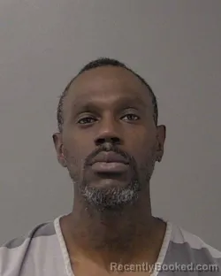 Mugshot of Albert Derrick Burton booked in Macon County, Illinois on October 6, 2026