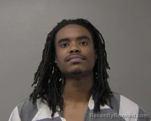 Mugshot of Markez Lamar. Cunningham booked in Macon County, Illinois on October 8, 2026