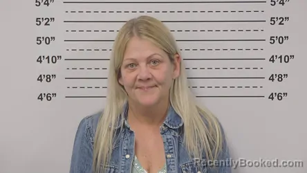 Mugshot of CHRISTINA WHITTEN booked in Macoupin County, Illinois on March 20, 2026