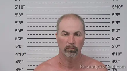 Mugshot of JUSTIN PARKER booked in Macoupin County, Illinois on March 21, 2026