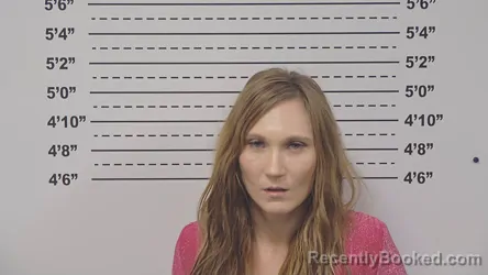 Mugshot of GENIESE ASCHMELLER booked in Macoupin County, Illinois on March 30, 2026