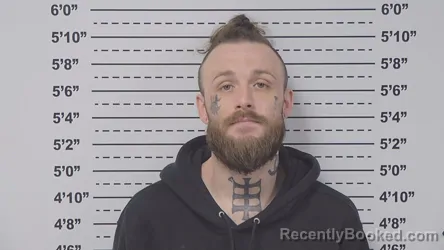 Mugshot of CHASE TAUCHERT booked in Macoupin County, Illinois on April 20, 2026