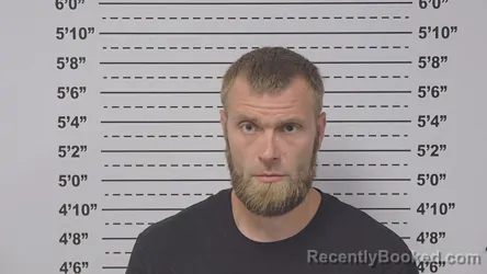 Mugshot of TYLER DAVIS booked in Macoupin County, Illinois on April 24, 2026