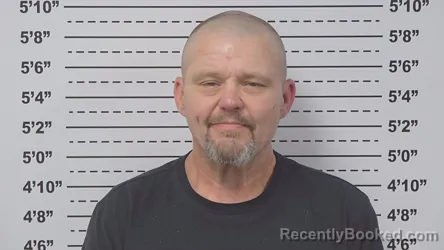 Mugshot of MARTY ROLLAND booked in Macoupin County, Illinois on June 26, 2026