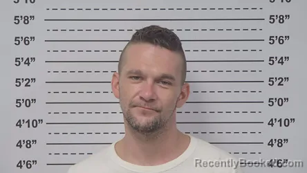 Mugshot of AUSTIN COURIER booked in Macoupin County, Illinois on June 30, 2026