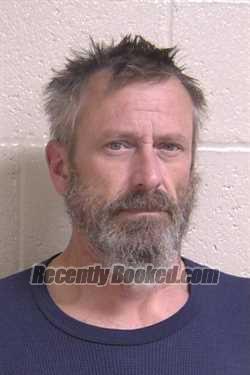 Booking photo from Madison County, Illinois