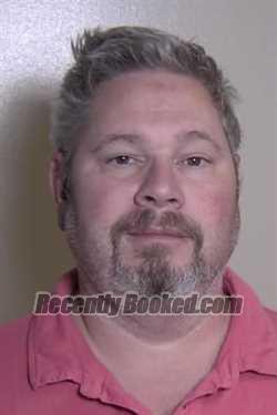 Booking photo from Madison County, Illinois