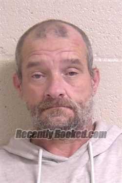 Booking photo from Madison County, Illinois