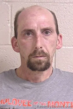 Mugshot of TRAVIS MUNDY