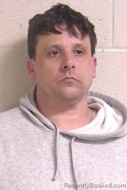 Mugshot of ADAM COOMBS booked in Madison County, Illinois on May 6, 2026