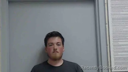 Mugshot of JACK J.M. HAUSSMAN booked in Monroe County, Illinois on April 10, 2026