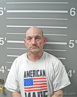 Mugshot of TRAVIS L HARTMAN