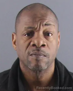 Mugshot of CLAUDE W JONES