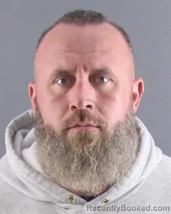 Mugshot of SETH J SCHWINDENHAMMER