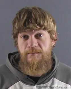 Mugshot of DALTON D HODGSON