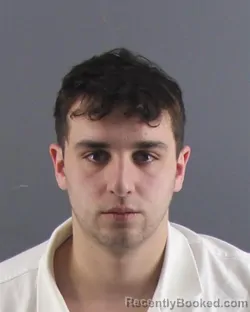 Mugshot of CHRISTIAN A BURMOOD