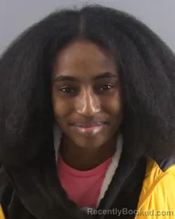 Mugshot of NYERHEE MOORE