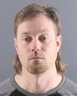 Mugshot of BENJAMIN C. LARSON