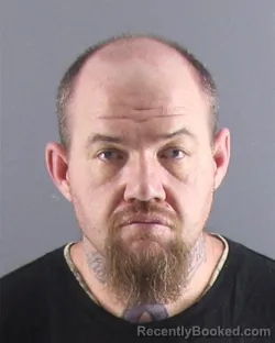 Mugshot of TRAVIS R WHEELER