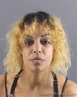 Mugshot of CARLISHA S FLOWERS booked in Peoria County, Illinois on March 30, 2026